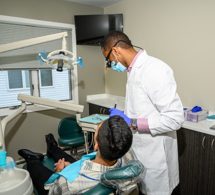 Doctor G giving a patient a dental exam