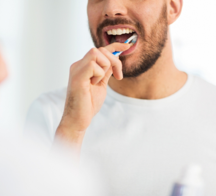 Man brushing his teeth