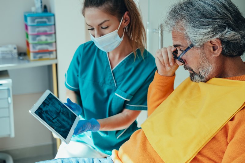 patient undergoing dental implant consultation in Staten Island